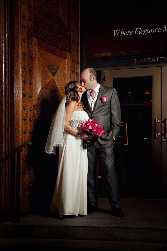 Bride and groom in front of The Society Room of Hartford